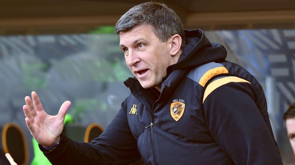 Hull boss Sergej Jakirovic raises his hand