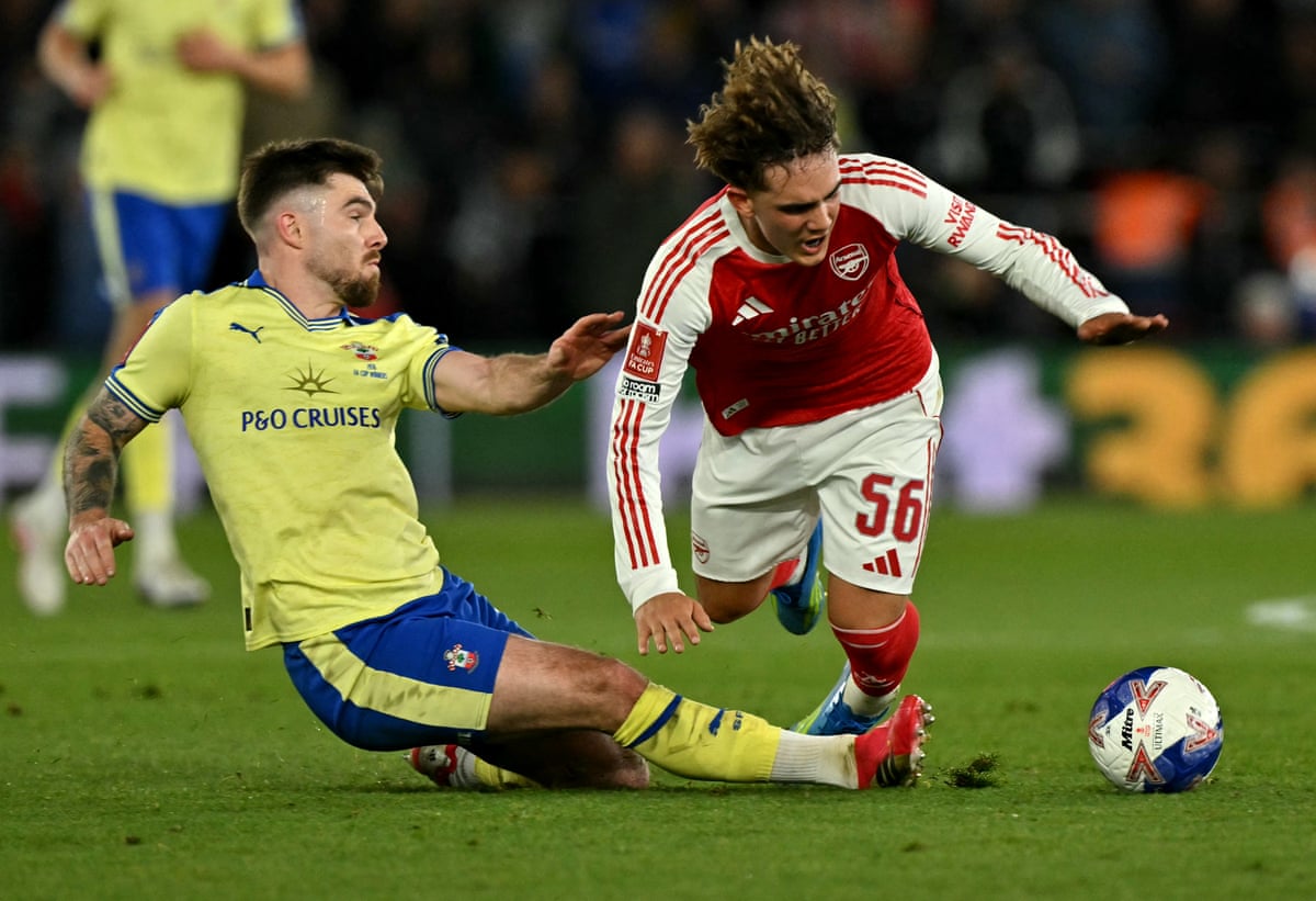 Ryan Manning fouls Max Dwoman.