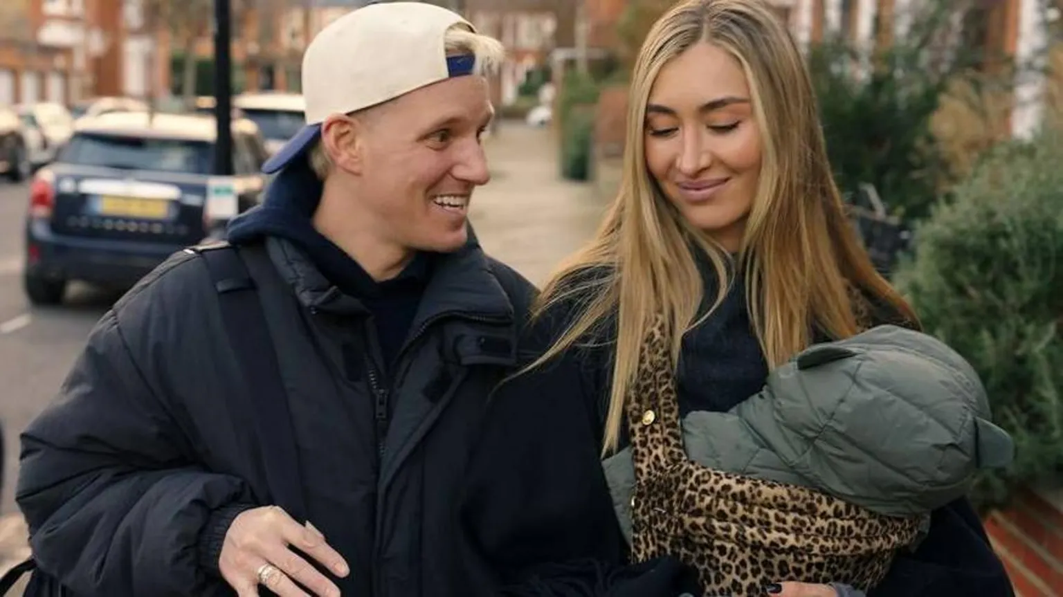 Hulu Jamie Laing and Sophie Habboo carrying a baby