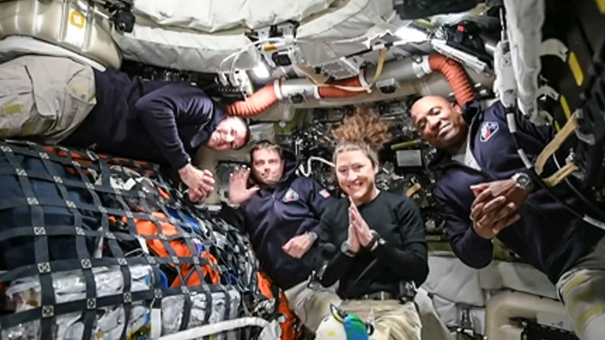 'You look beautiful': Artemis II crew makes contact from space – video