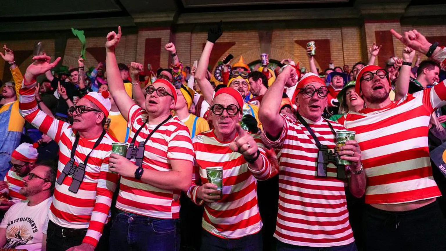 Fans dressed as Where's Wally at the World Darts Championships at the Alexandra Palace in London.