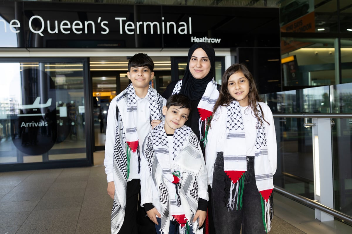 Mariam with her mother and two brothers outside Heathrow.