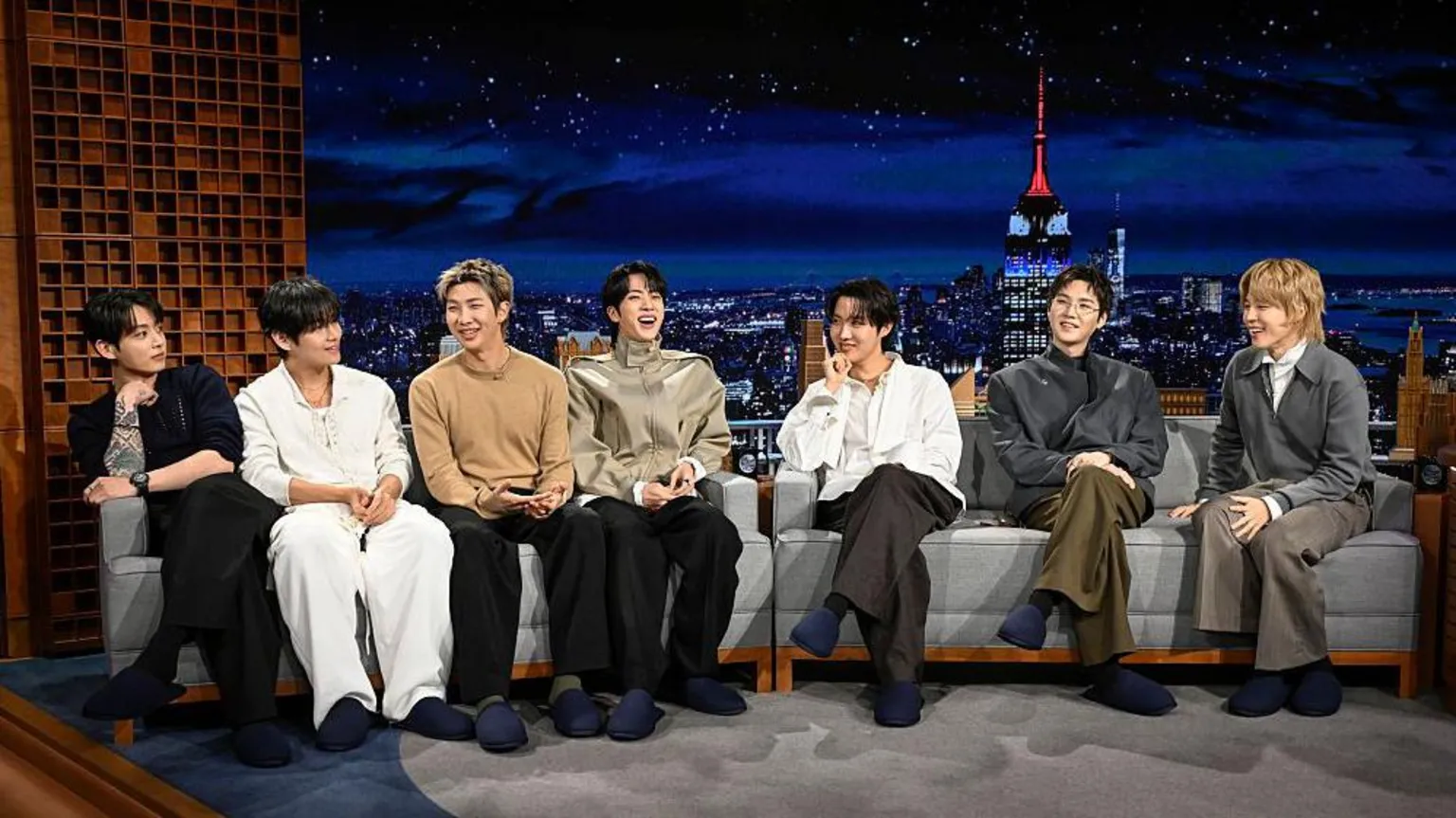  Pictured: (L-R) Jung Kook, V, RM, Jin, j-hope, Suga, and Jimin of musical guest BTS during an interview on Wednesday, March 25, 2026 