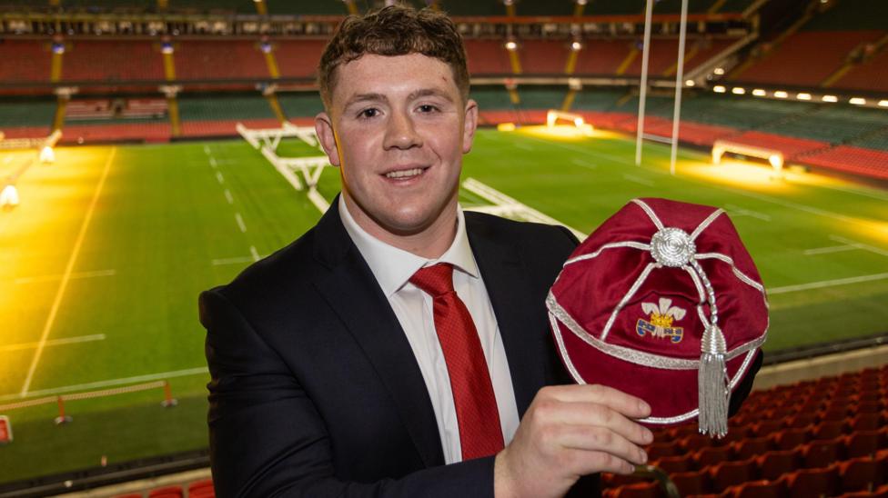 Brodie Coghlan with his Wales cap