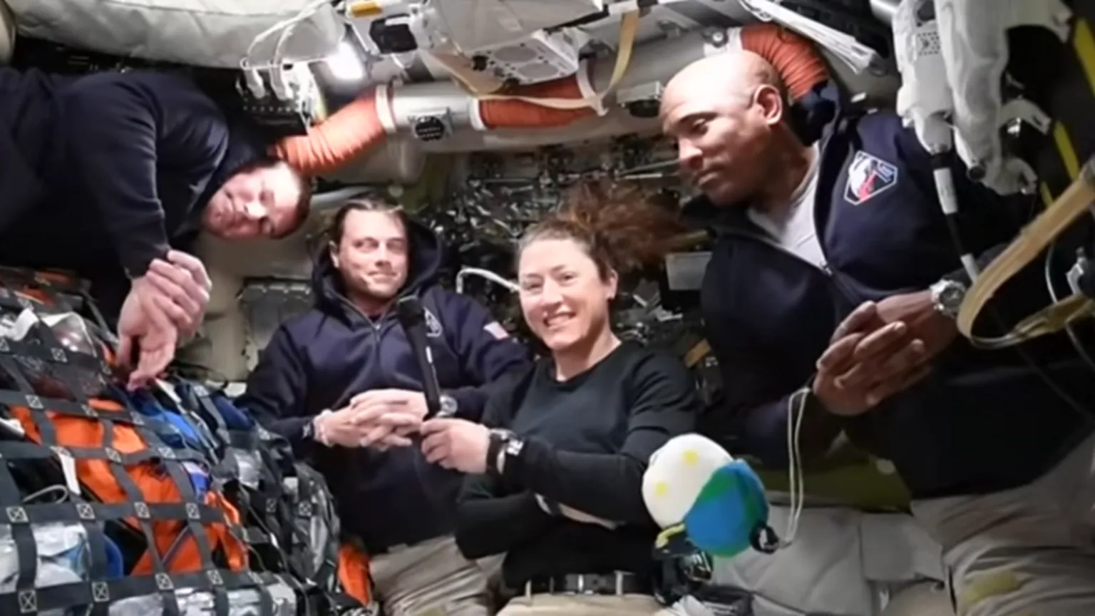 NASA (From left) Jeremy Hansen, Reid Wiseman, Christina Koch and Victor Glover conduct a live broadcast from space