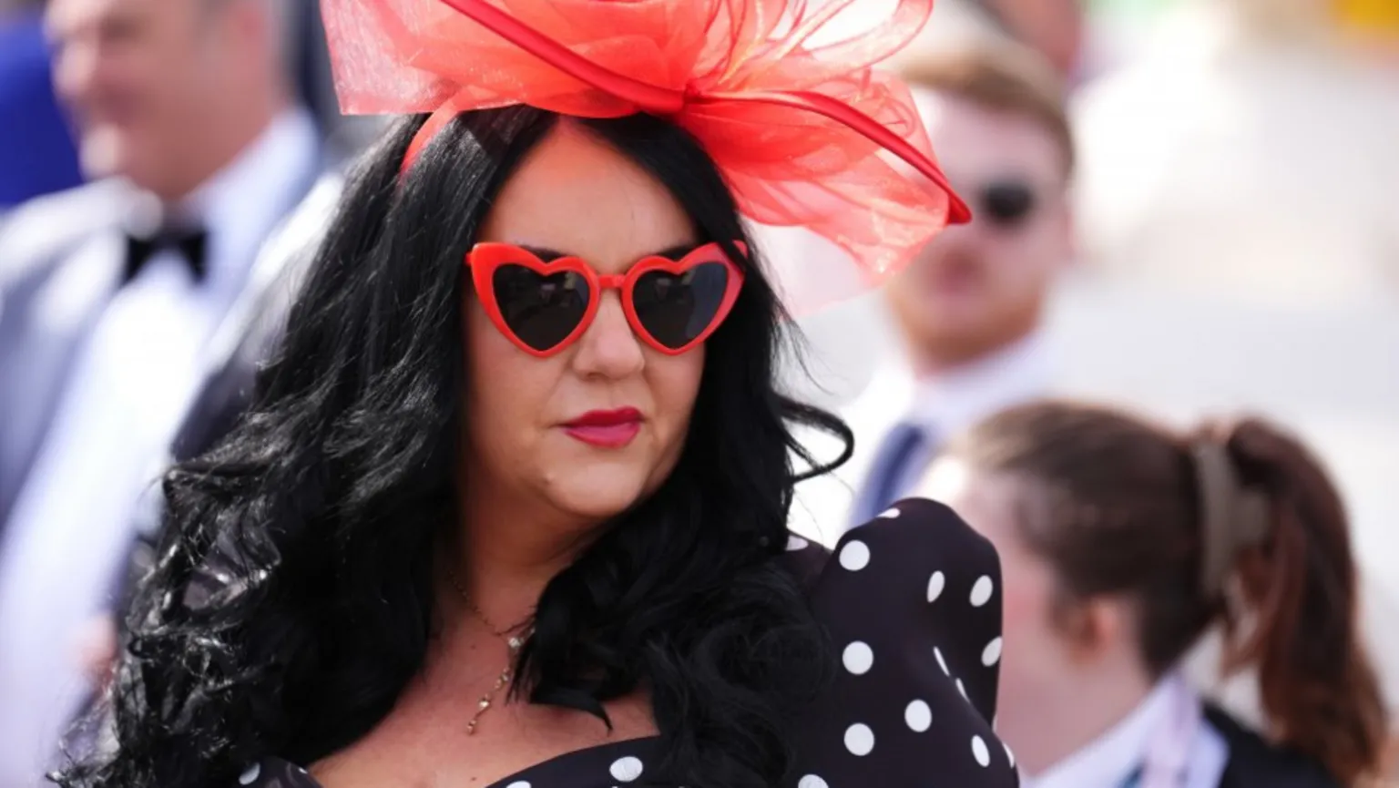  A racegoer on day two of the Randox Grand National Festival 2026 at Aintree Racecourse.