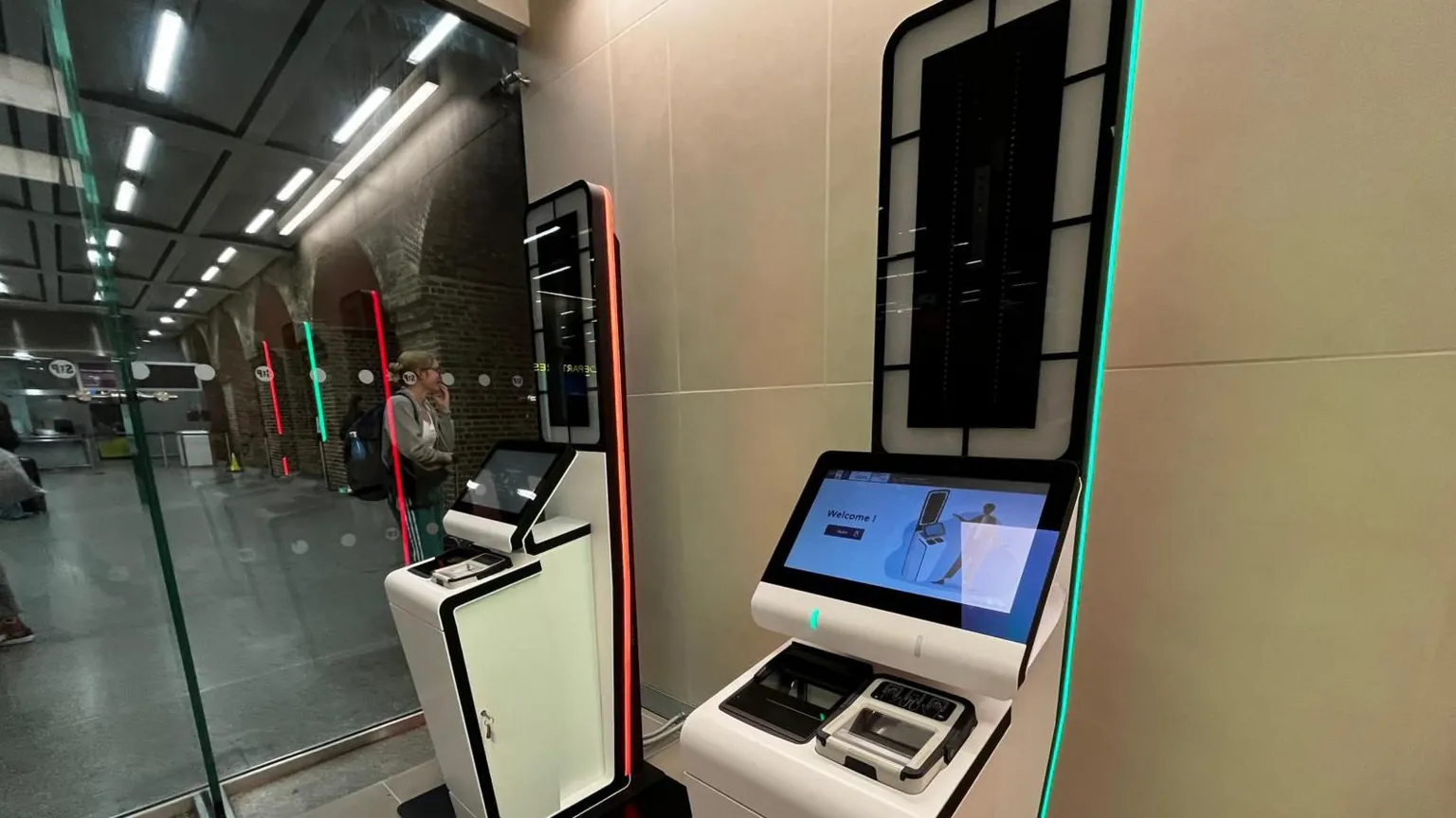 Two of the 49 new automated kiosks which Eurostar has installed at London St Pancras station, ready for the launch of the Entry/Exit System in October. Each white machine has a computer screen and a scanning device for passports. 