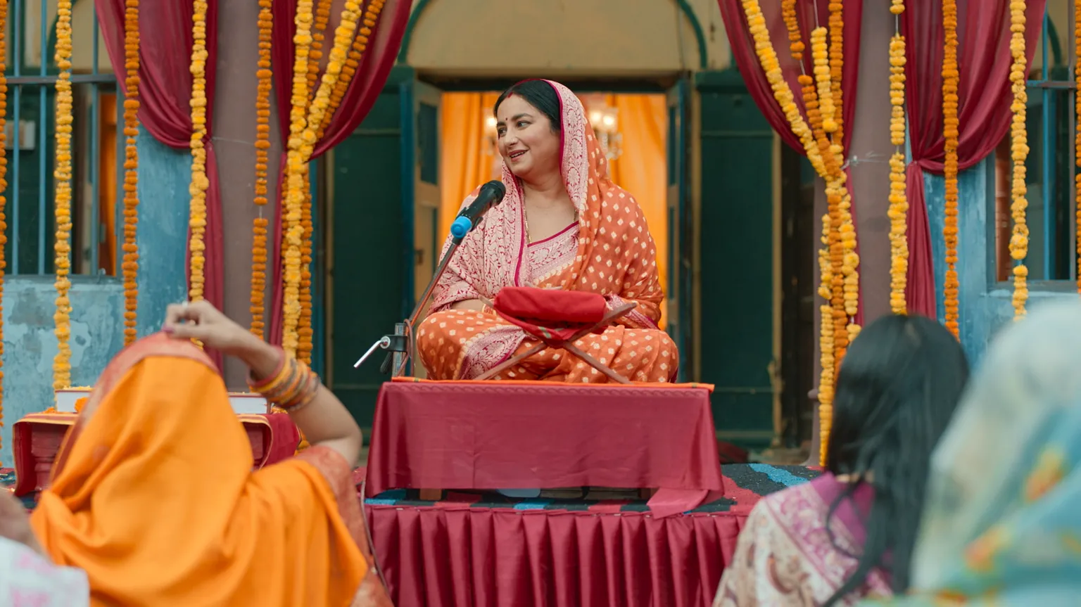 JioHotstar Kamlesh sits on a stage