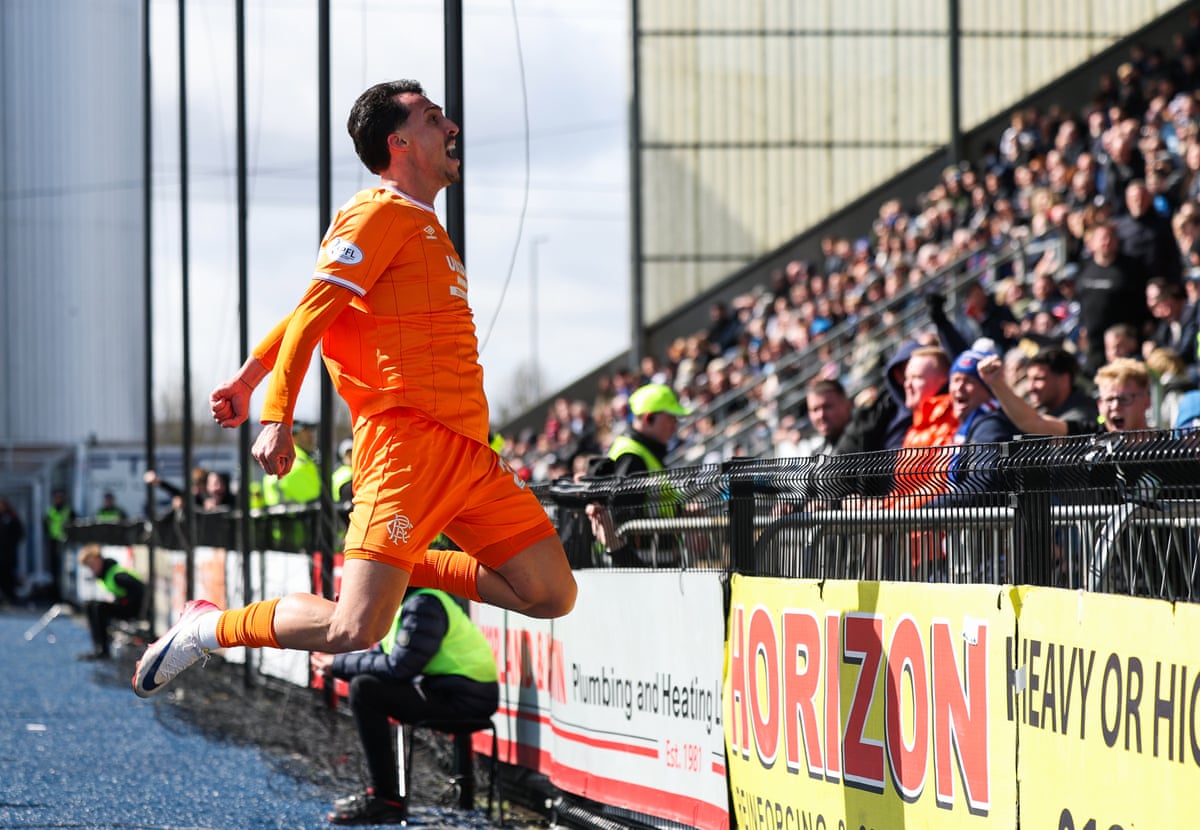Bojan Miovski of Rangers celebrates scoring the fourth goal for Rangers.