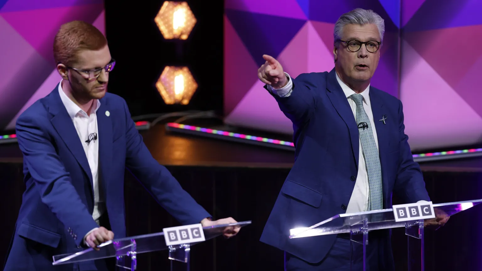 Ross Greer, on the left, and Malcolm Offord during the debate.