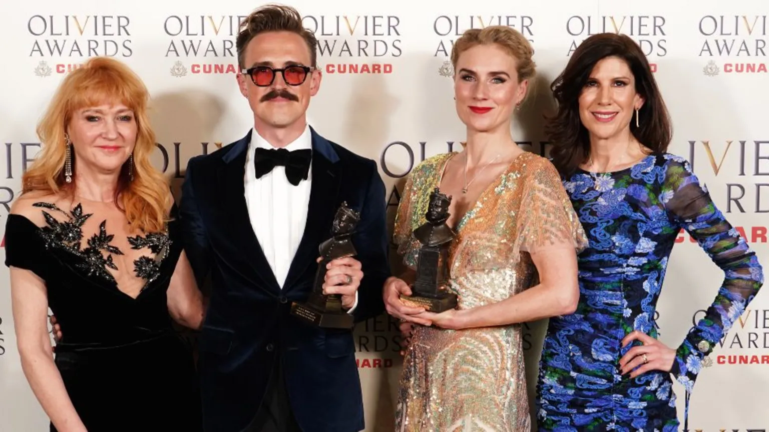 Sonia Friedman, Tom Fletcher, Jessica Swale and Eliza Lumley with their Cunard Best New Musical award for Paddington at The Olivier Awards at the Royal Albert Hall, London.