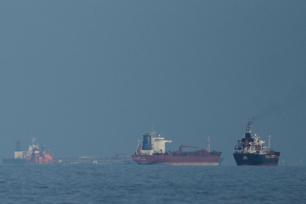 Oil tankers and cargo ships line up in the strait of Hormuz, seen in March