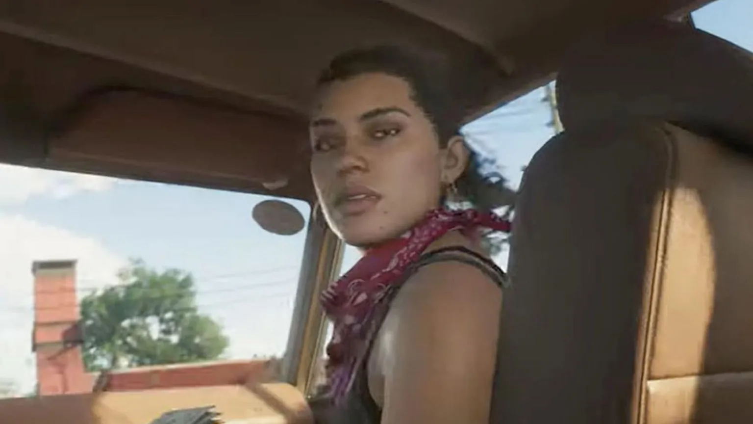 Rockstar/PA Wire Screengrab issued by Rockstar from the trailer of the sixth game in the Grand Theft Auto series, showing a woman wearing a neckerchief in the front seat of a car, holding money, on a sunny day.