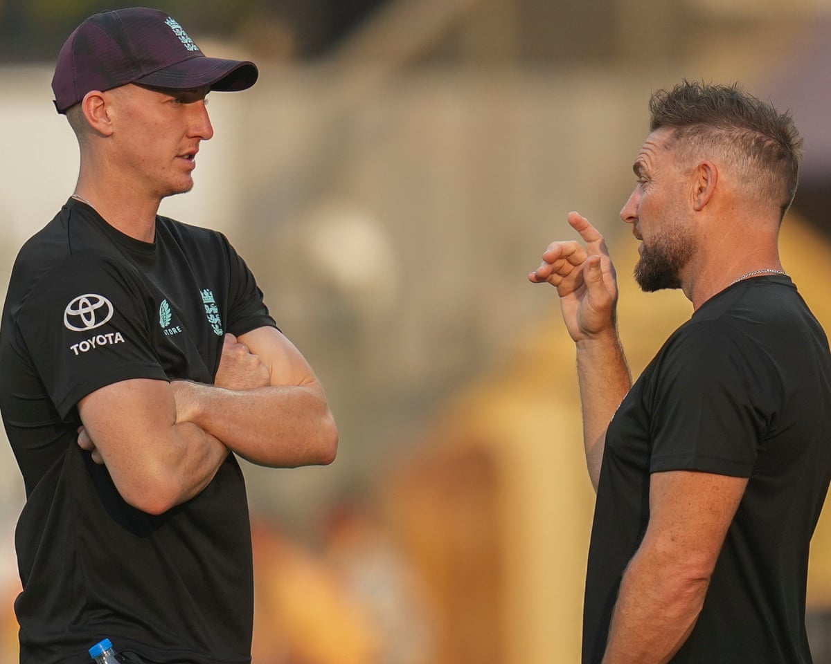 Harry Brook listens to Brendon McCullum during an England training session.
