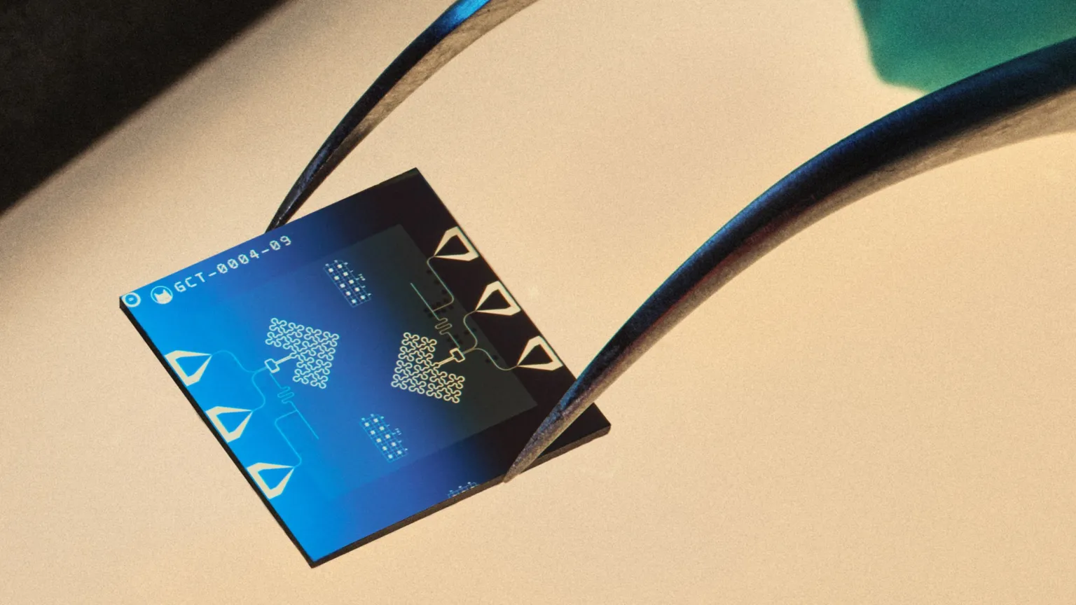 Alice & Bob A blue computer chip from Alice & Bob