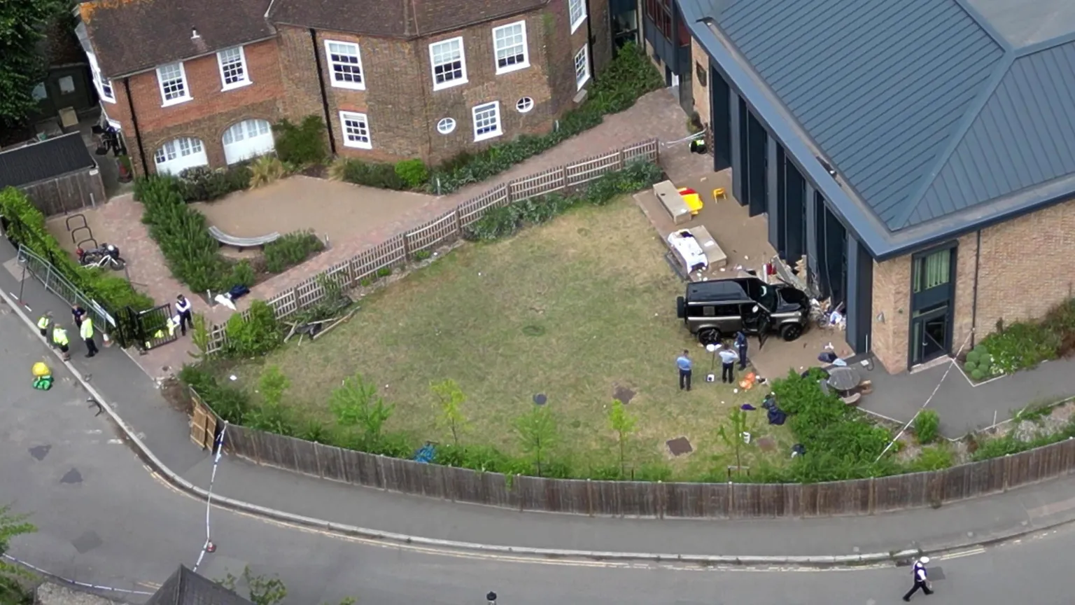  An aerial shot of a Land Rover Defender inside the grounds of The Study Preparatory School in Camp Road, Wimbledon, south London.
