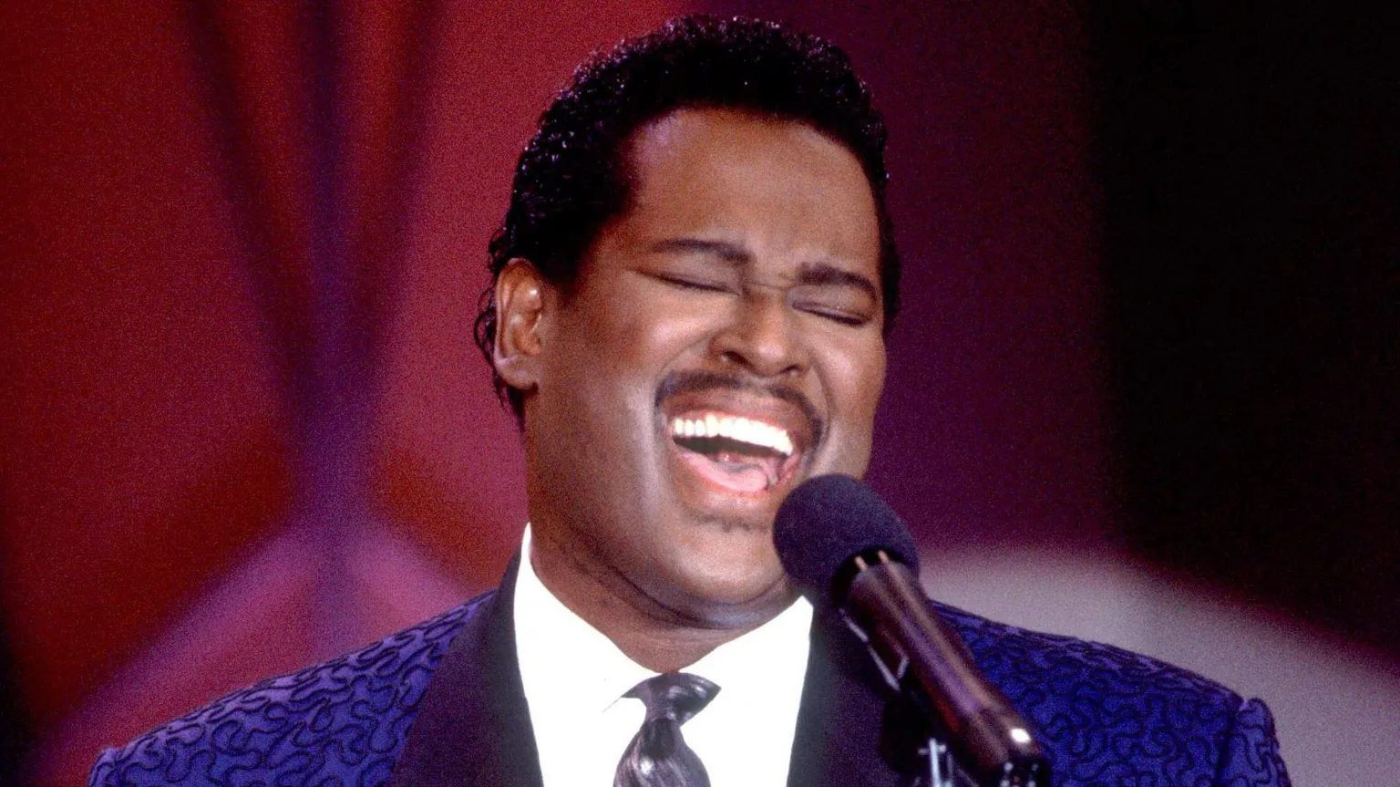 Luther Vandross on the Oprah Winfrey show in 1984, wearing a blue jacket