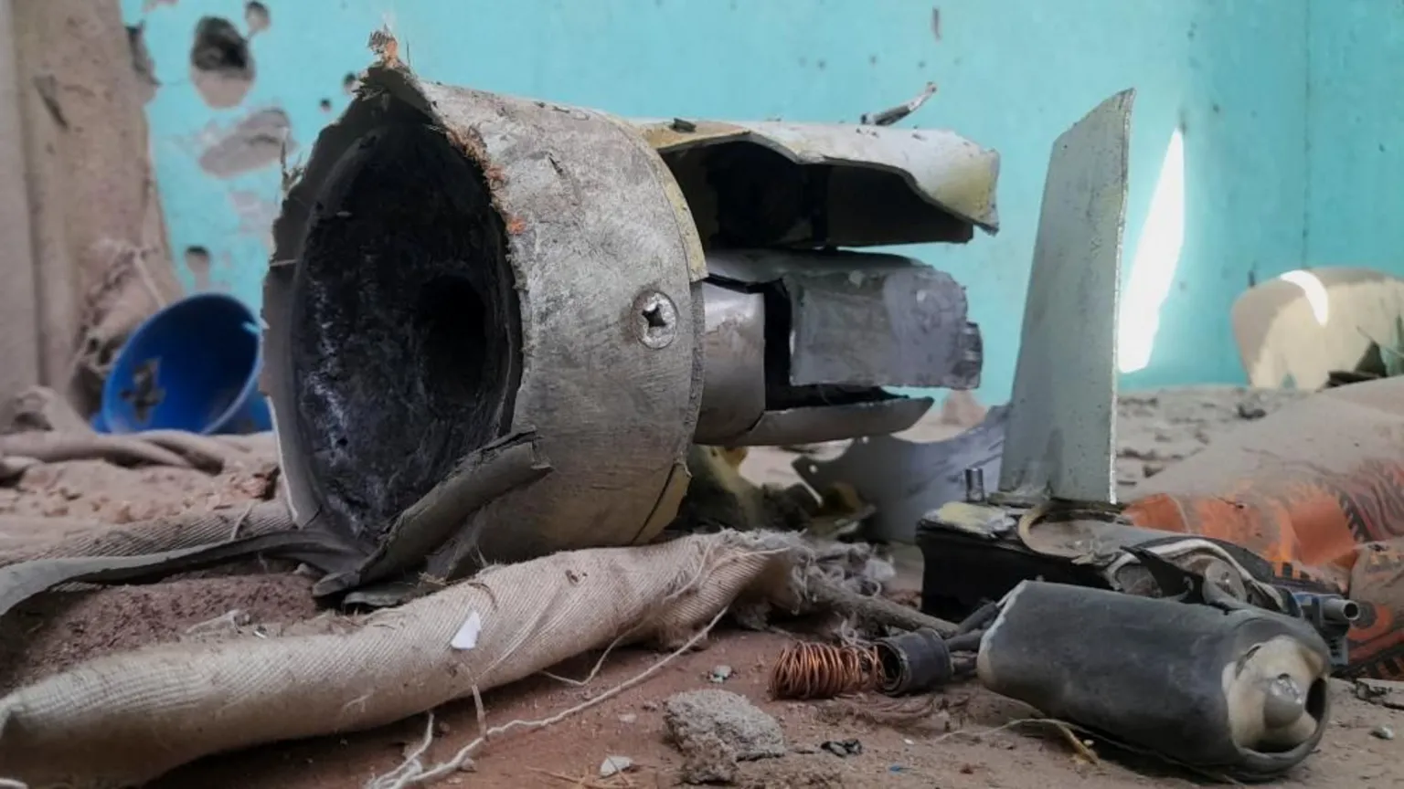 Remnants of a shell that targeted the refugee center, in el-Fasher, Sudan, October 7, 2025