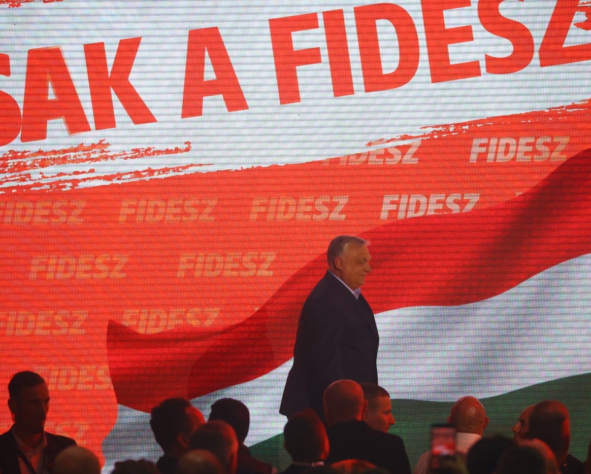 Hungarian prime minister Viktor Orbán walks in front of a screen at the Fidesz Party headquarters in Budapest, Hungary.