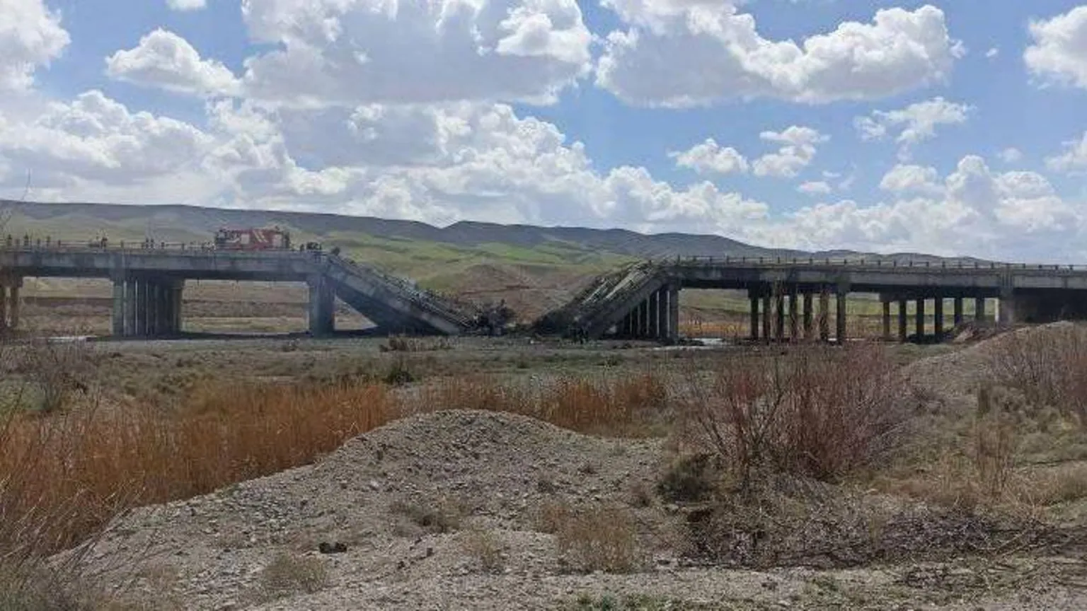 IRNA News Agency Image of a damaged highway published by Iran's IRNA news agency. The middle of the highway has collapsed into the ground.