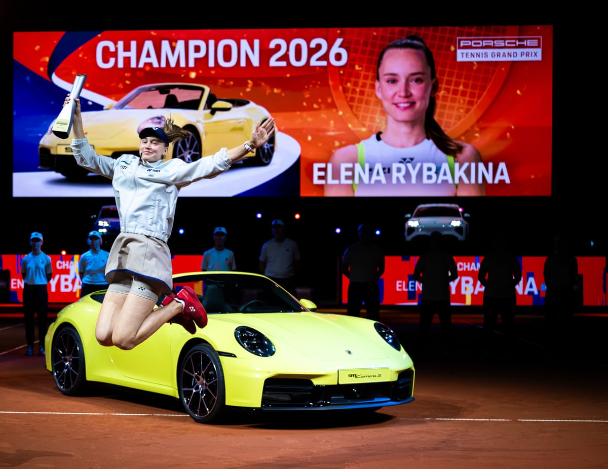 Elena Rybakina with the champions trophy and a new Porsche after defeating Karolina Muchova in Stuttgart.