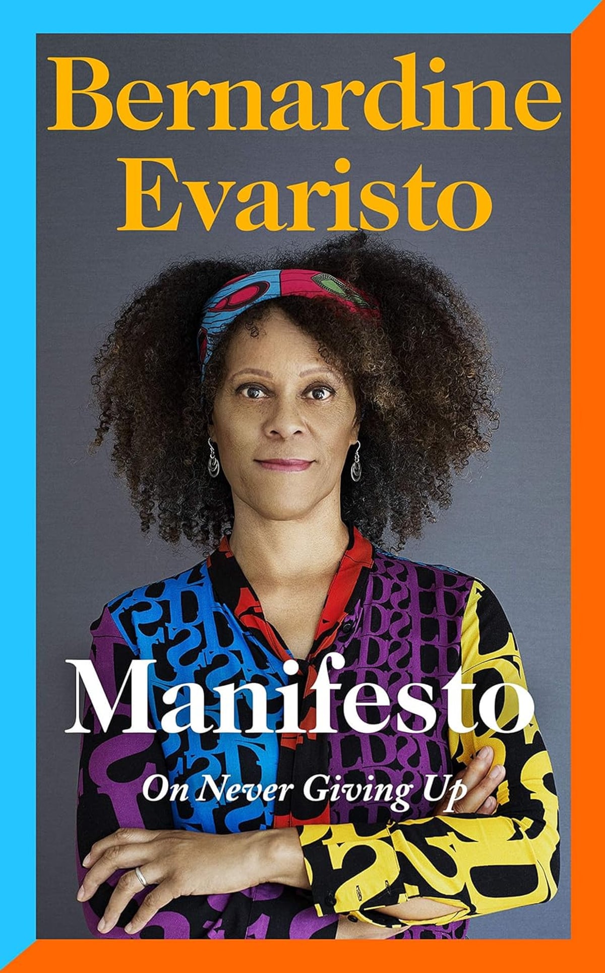 Manifesto book cover with Evaristo in brightly coloured shirt