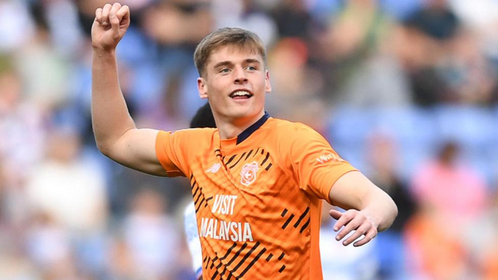 Dylan Lawlor celebrates Cardiff's promotion