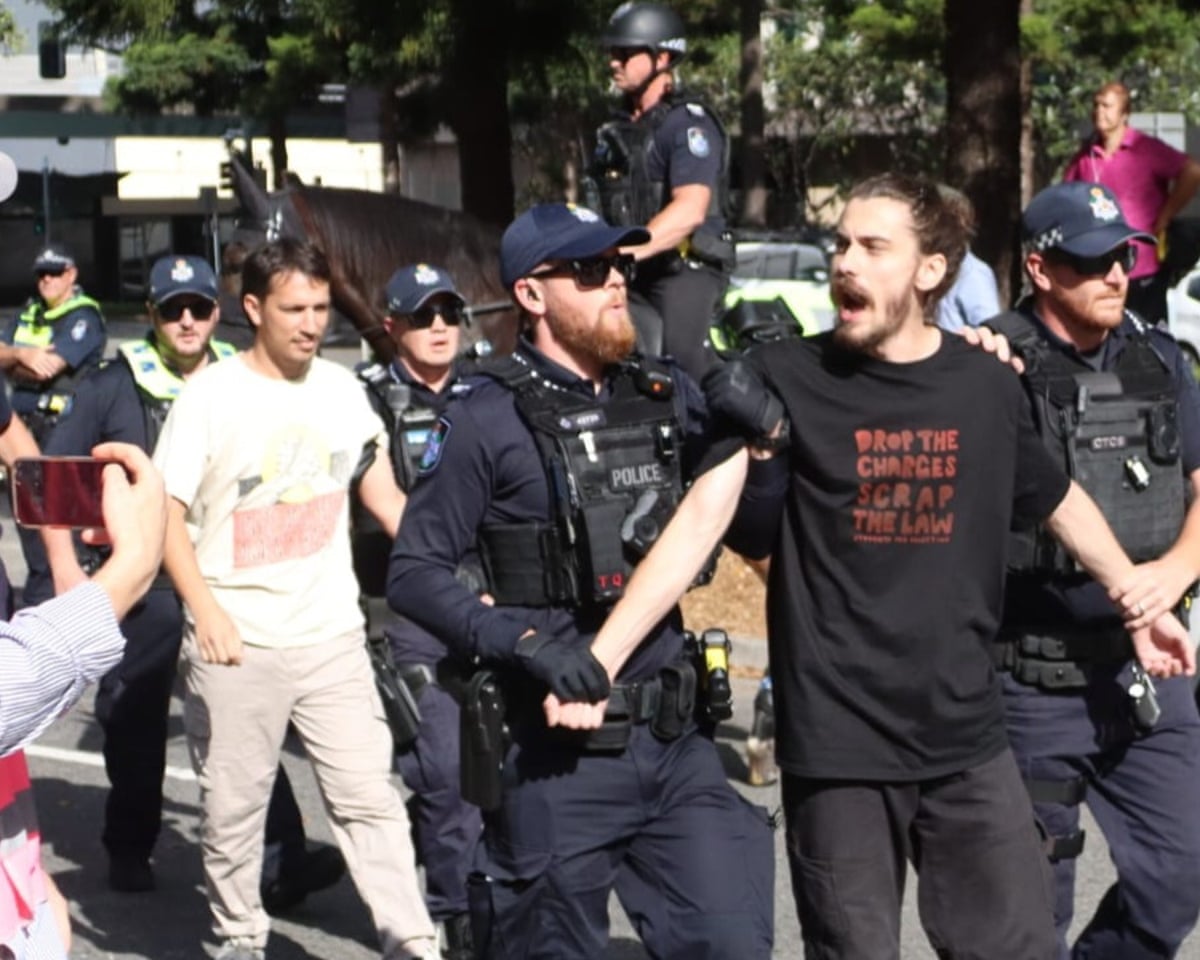Zac Karaniki, right, and William Sim, in white T-shirt, were arrested at a pro-Palestinian protest on Sunday