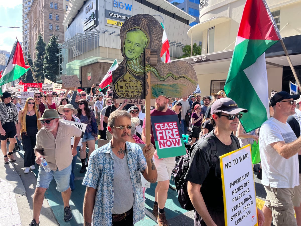 Pro-Palestinian protesters march through Brisbane on Sunday