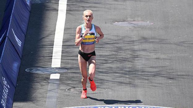 Calli Hauger-Thackery of Great Britain runs to the finish line of the 129th Boston Marathon on April 21, 2025. 