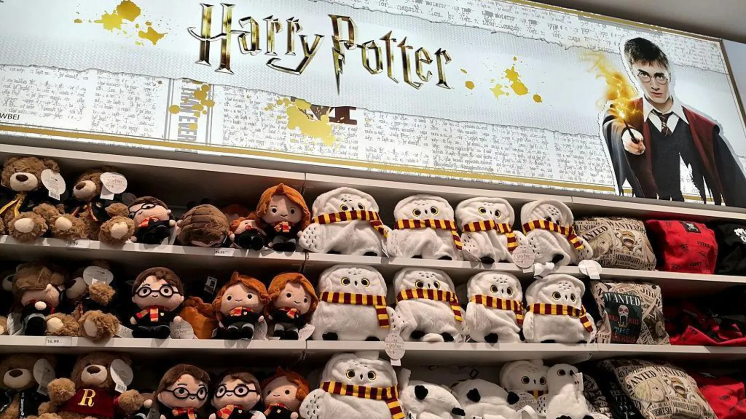  Harry Potter merchandising at Miniso, a toy store with plush toys and various merchandise in Madrid, Spain.