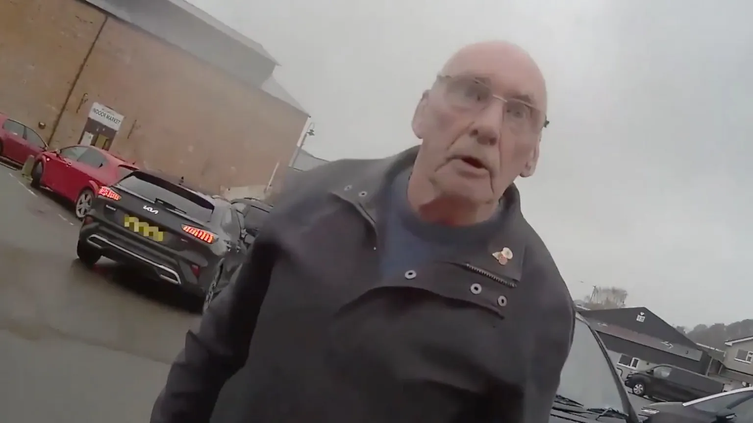 Crown Prosecution Service A man angrily looking at a person wearing body cam footage.