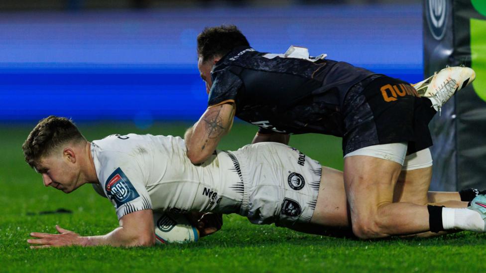 Ethan Hooker scores a try for Sharks against Ospreys