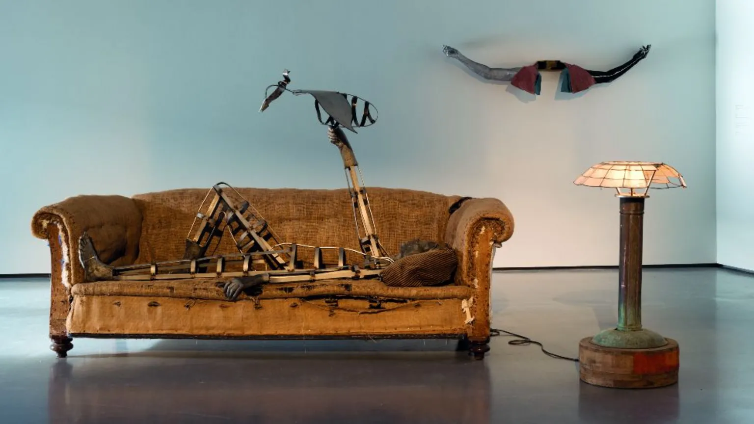 Lewis Ronald A sculpture from Kira Freije: Unspeak the Chorus atThe Hepworth Wakefield, November 2025, showing a human-shaped figure lying flat on a sofa