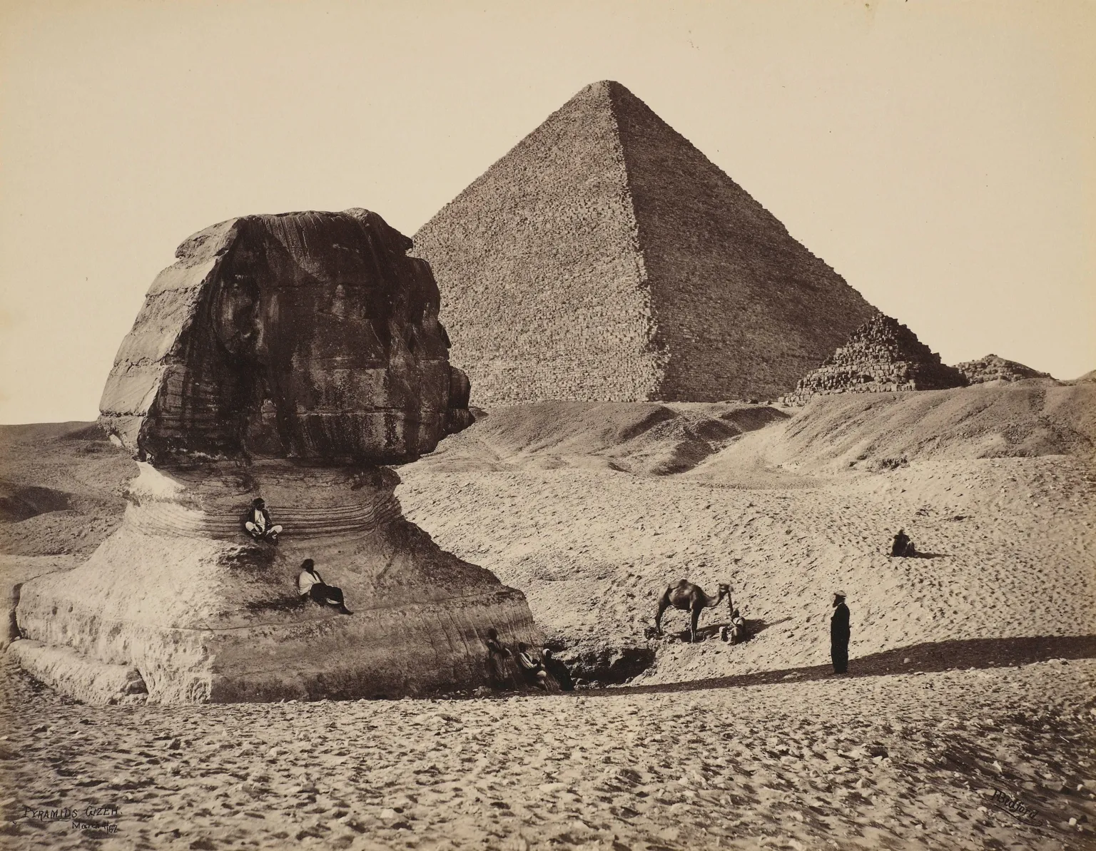 Royal Collection Enterprises Limited 2026 A black and white image of the sphinx and great pyramid at Giza.