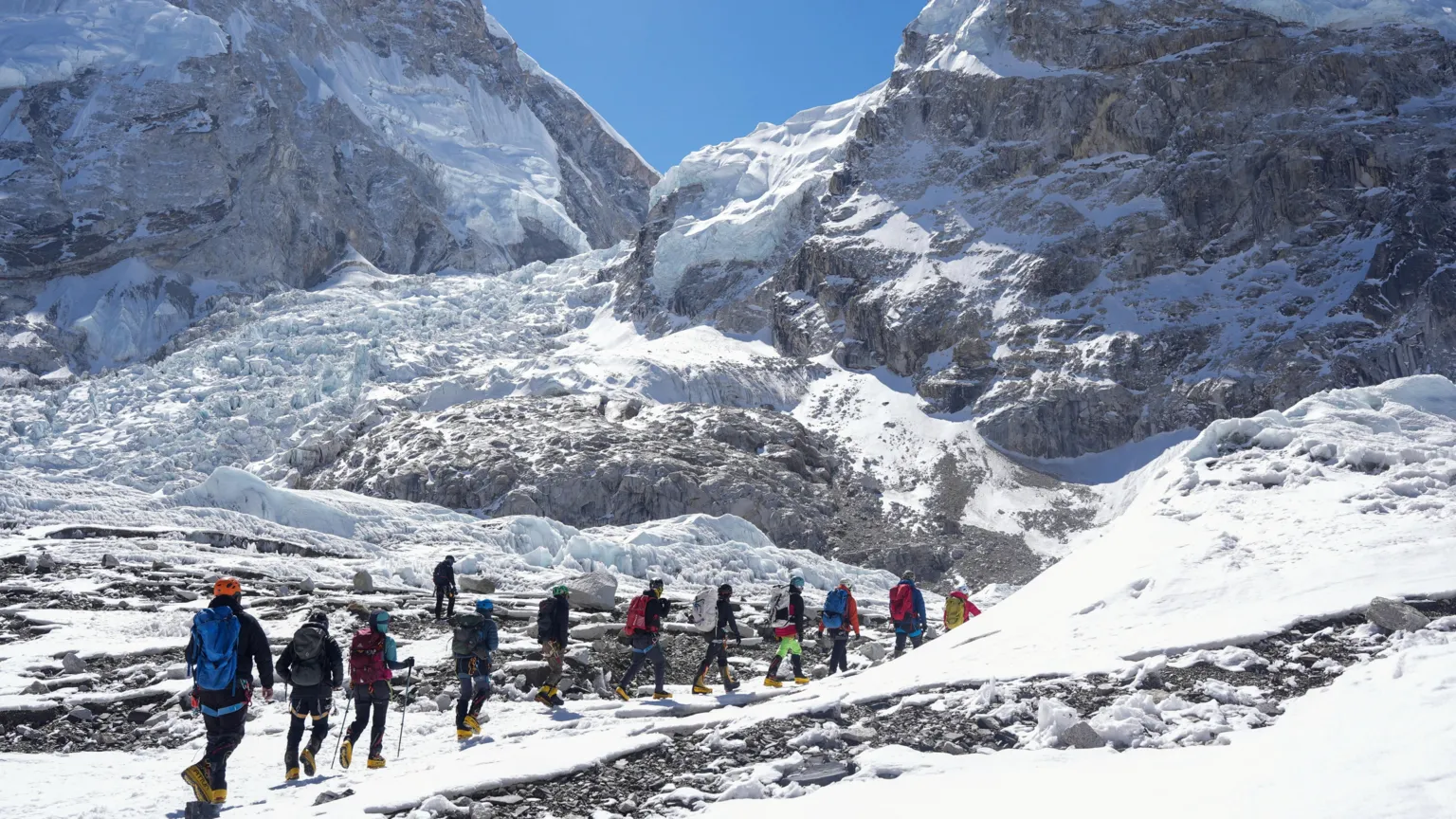  Members of an expedition team hike at Khumbu Icefall, as the route to Mount Everest Camp One has not yet been opened