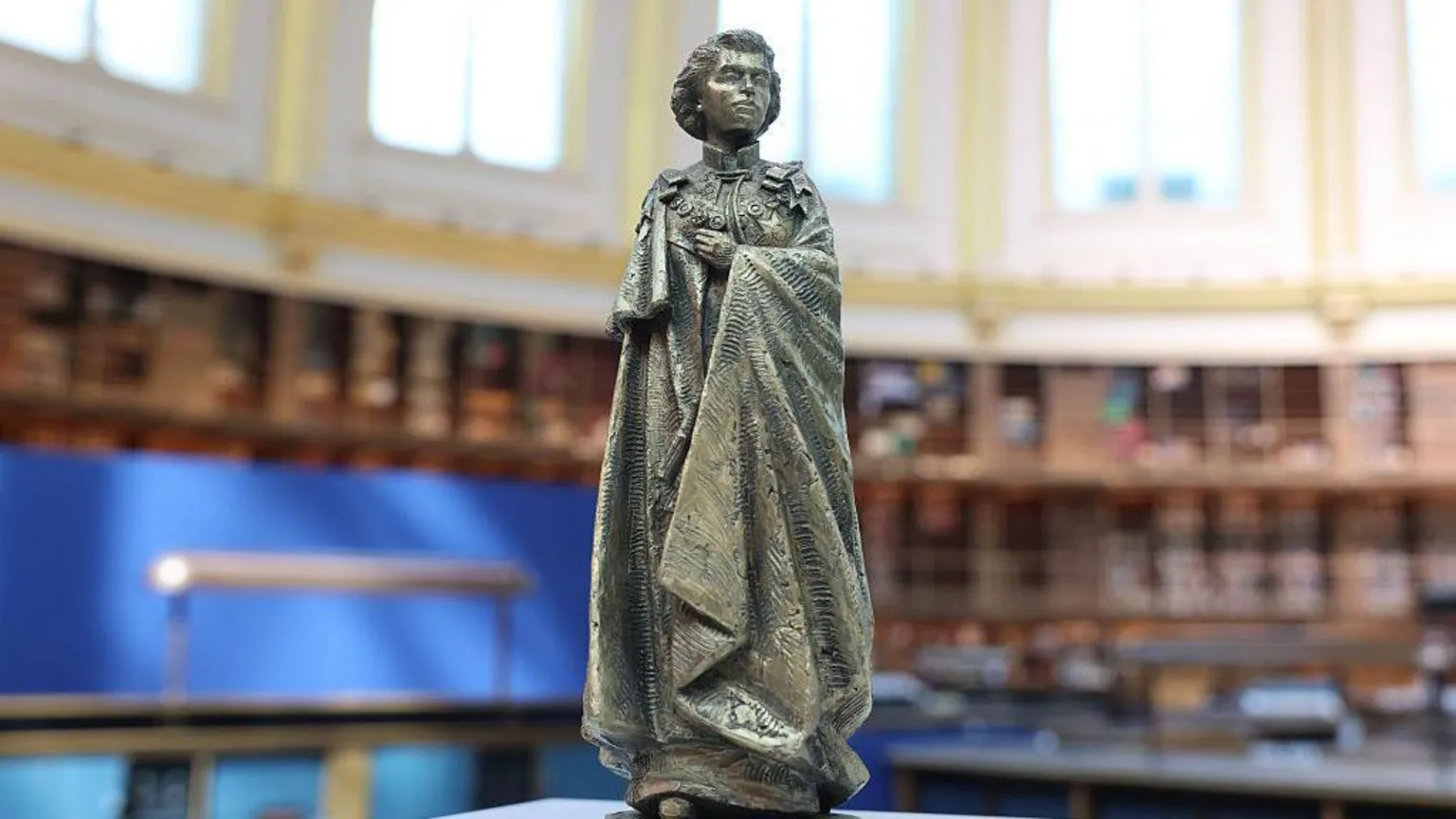 Ian Vogler/ A model scale statue of Queen Elizabeth II.