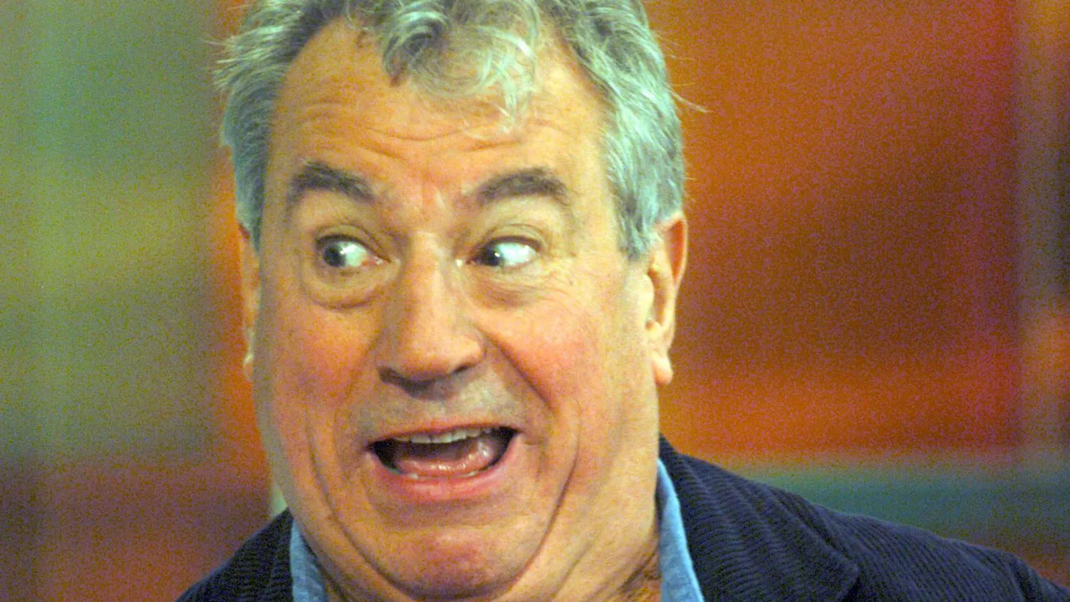 A photo of Terry Jones smiling taken from a BBC Television interview
