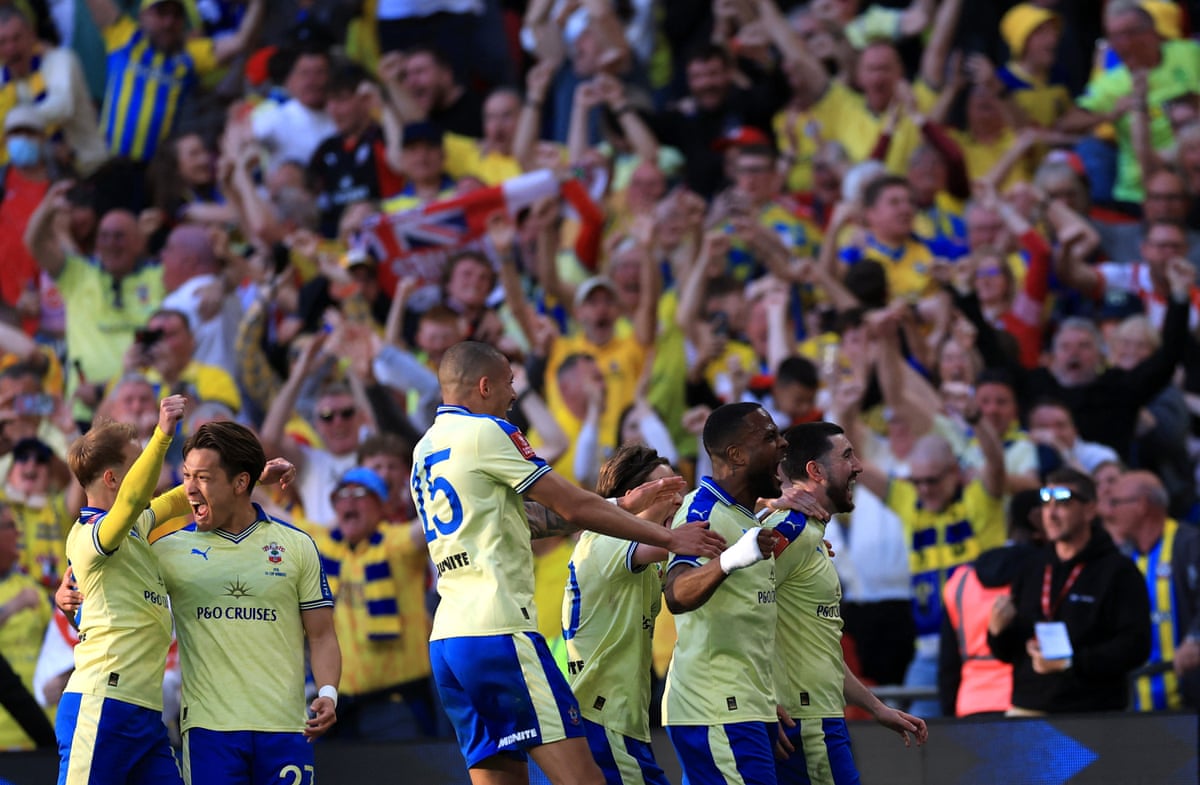 Southampton's Finn Azaz celebrates scoring their first goal with teammates.