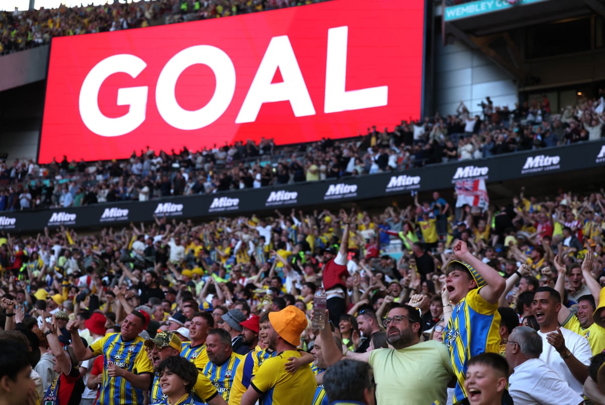 Southampton fans celebrate Finn Azaz scoring their first goal.