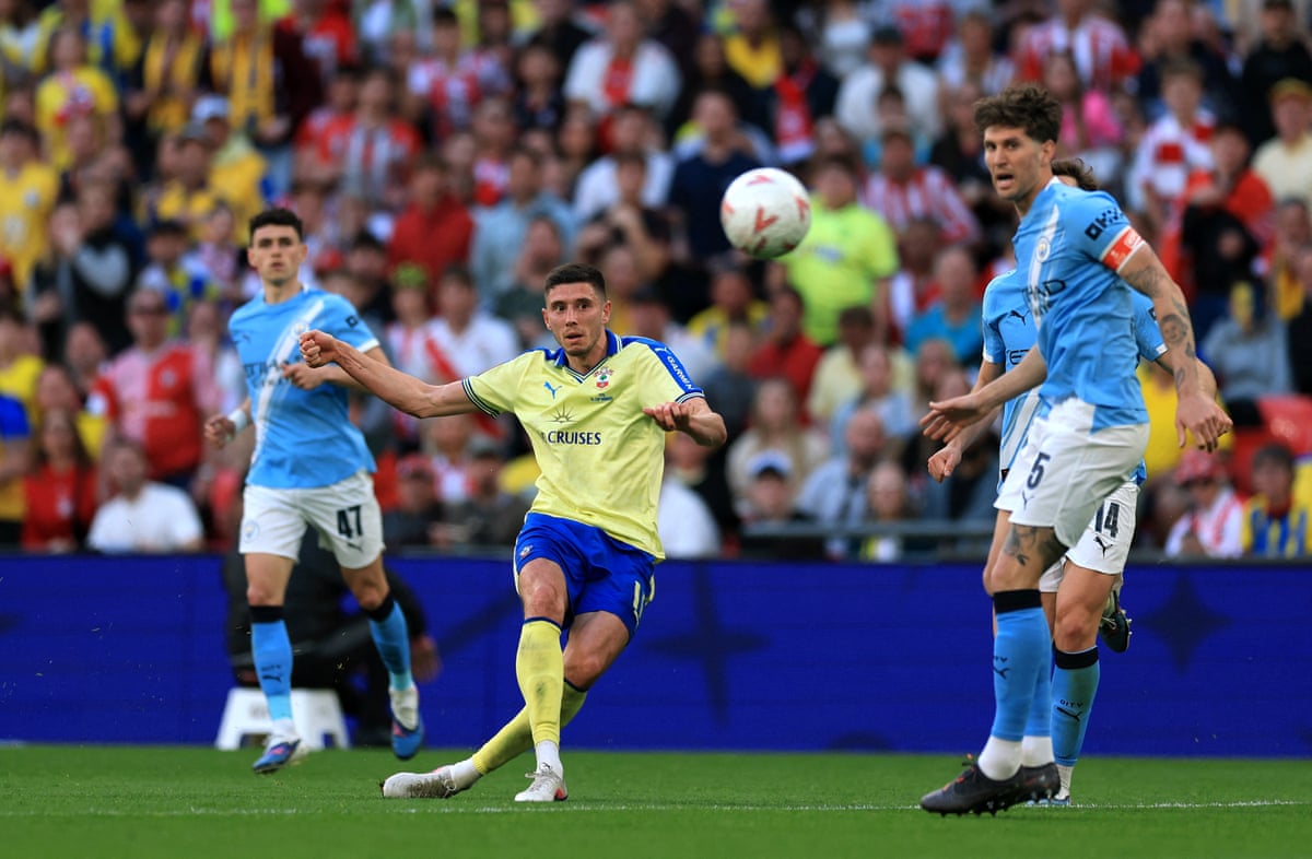 Southampton's Ross Stewart tries a curler.