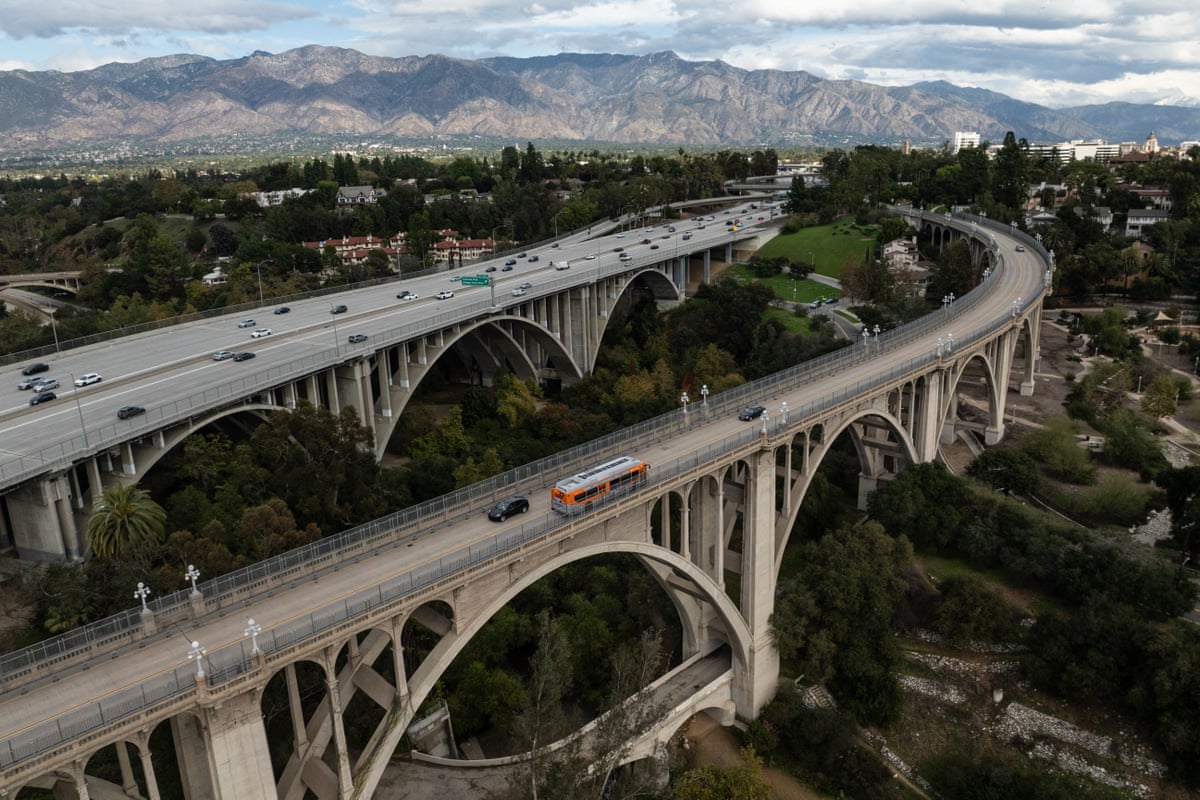 The Colorado Street Bridge with a more modern interstate bridge behind it