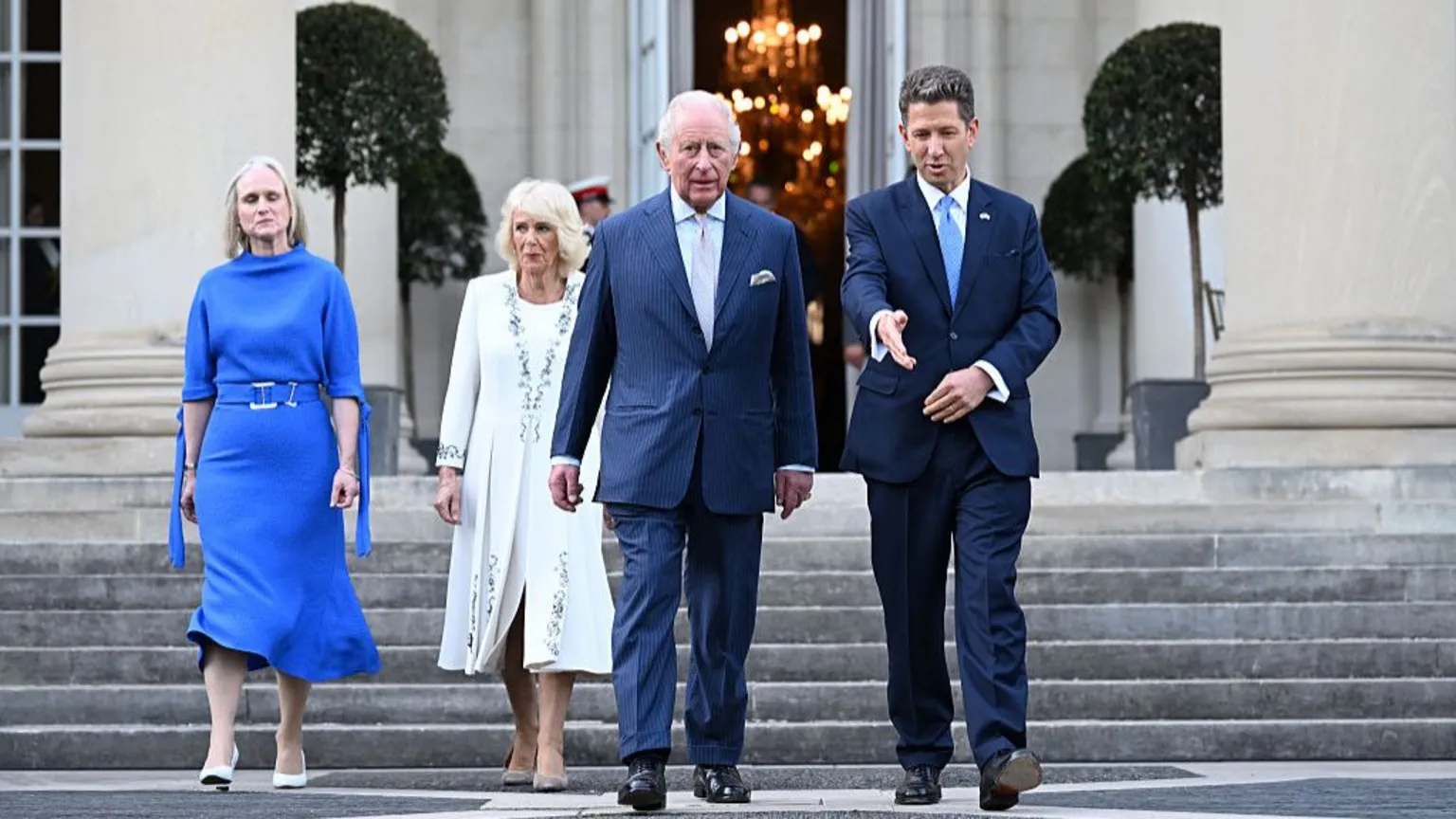 Samir Hussein via Claire Turner, Queen Camilla, King Charles III and Sir Christian Turner, British ambassador to the US, attend the garden party at the British Embassy in Washington DC.