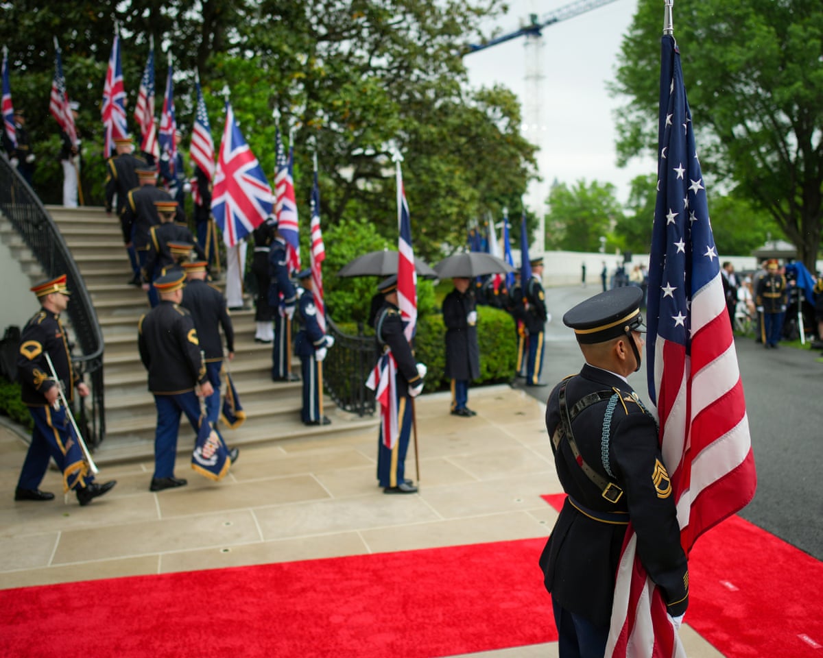 Military Honor Guard enter during the state arrival ceremony.