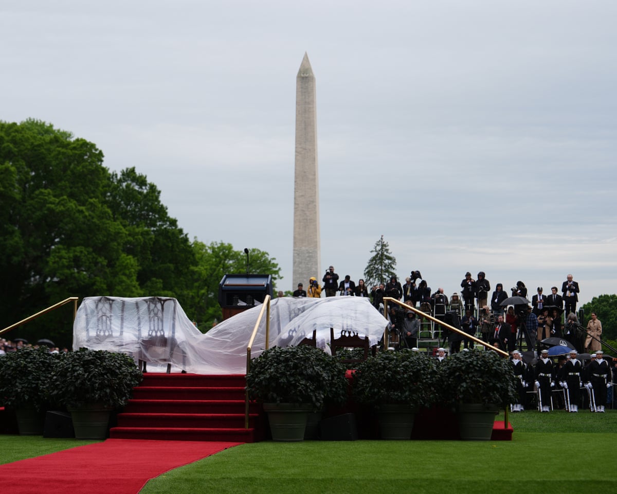 Chairs are covered to protect them from the rain.