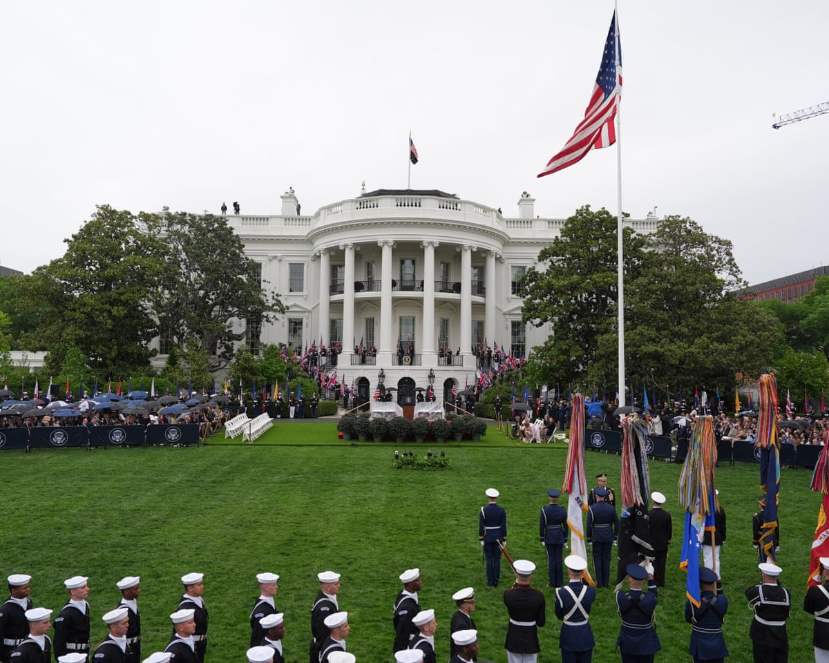 Members of the military and guests arrive before Donald Trump and first lady Melania Trump greet King Charles III and Queen Camilla.