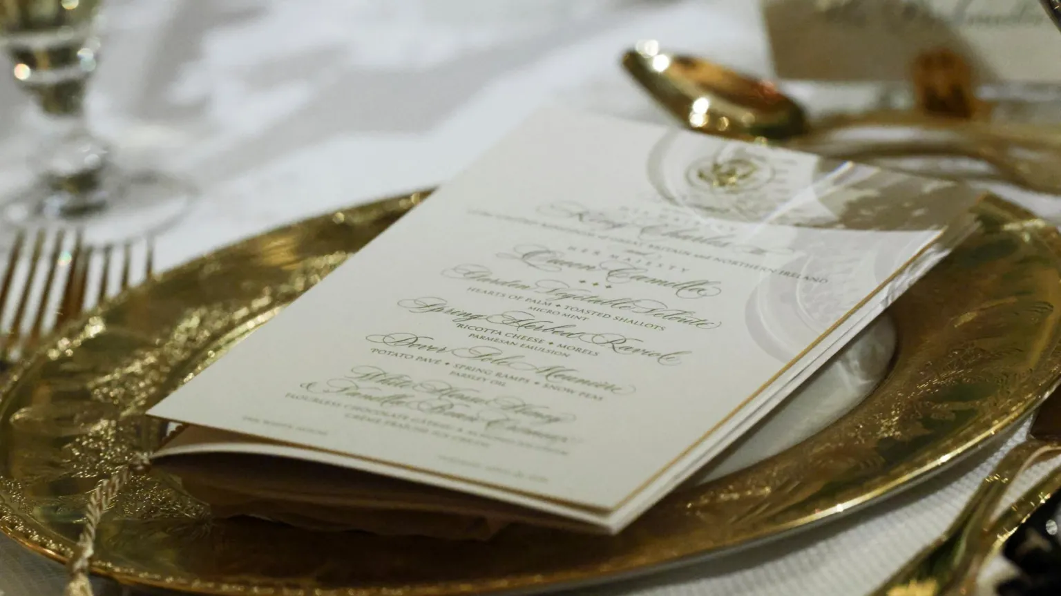  A menu and place setting during a state dinner for Britain's King Charles and Queen Camilla at the White House in Washington, D.C., U.S., April 28, 2026. /Evelyn Hockstein 