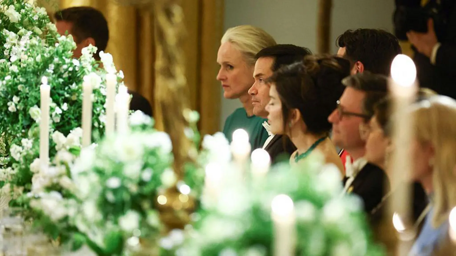  US Secretary of State Marco Rubio listens to US President Donald Trump speak during a State Dinner in honor of Britain's King Charles III and Queen Camilla in the East Room of the White House in Washington, DC, on April 28, 2026. (Photo by Henry Nicholls / AFP via ) 