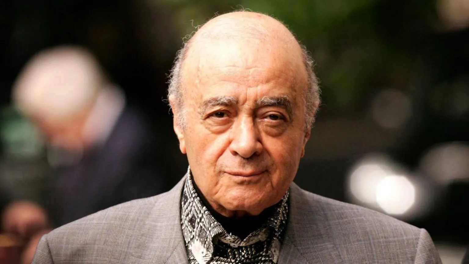 SHAUN CURRY/AFP via Headshot of Harrods department store owner Mohamed Al Fayed 