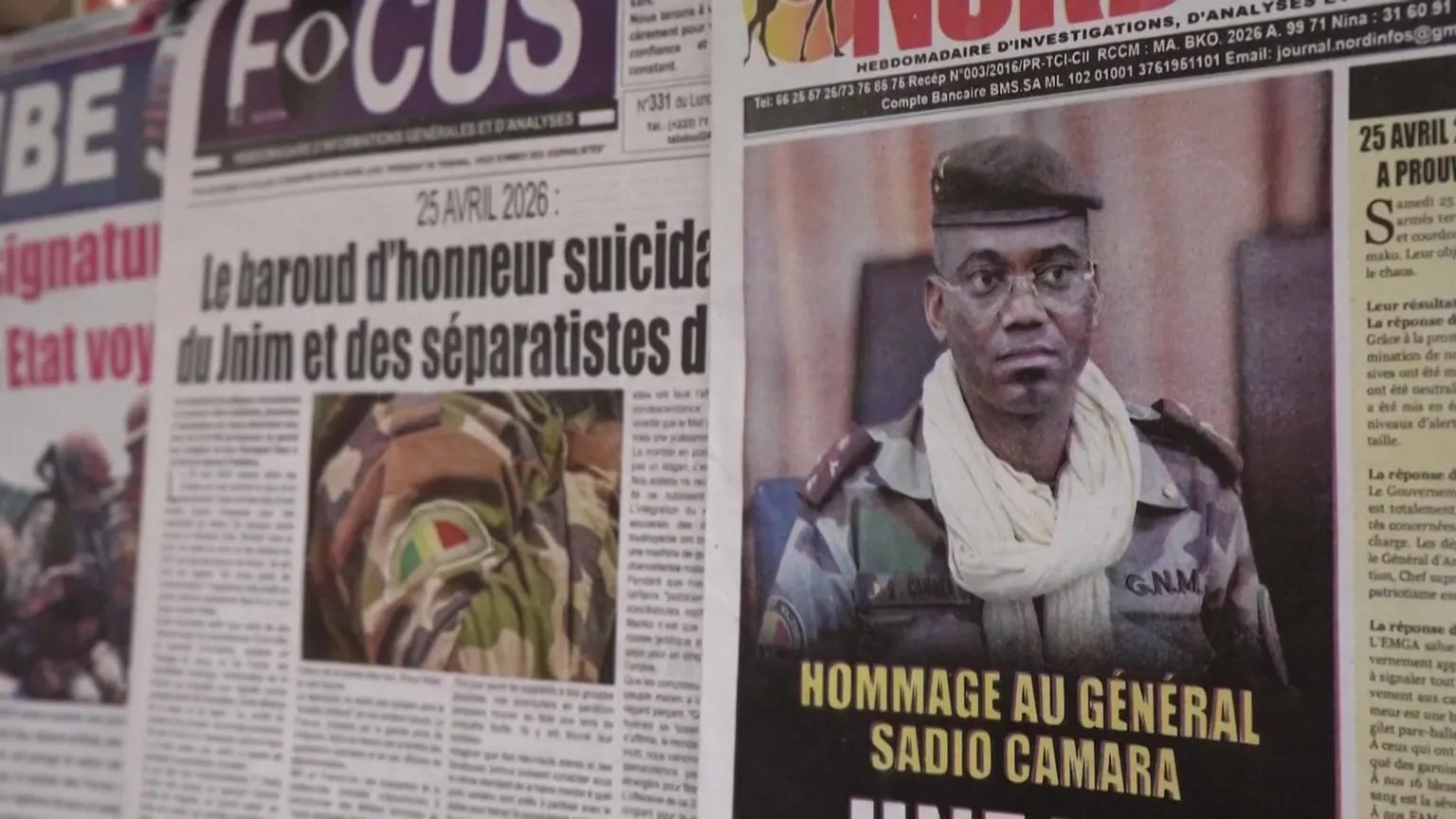  Newspapers at a stand in Bamako with a headline mourning the killed defence minister.